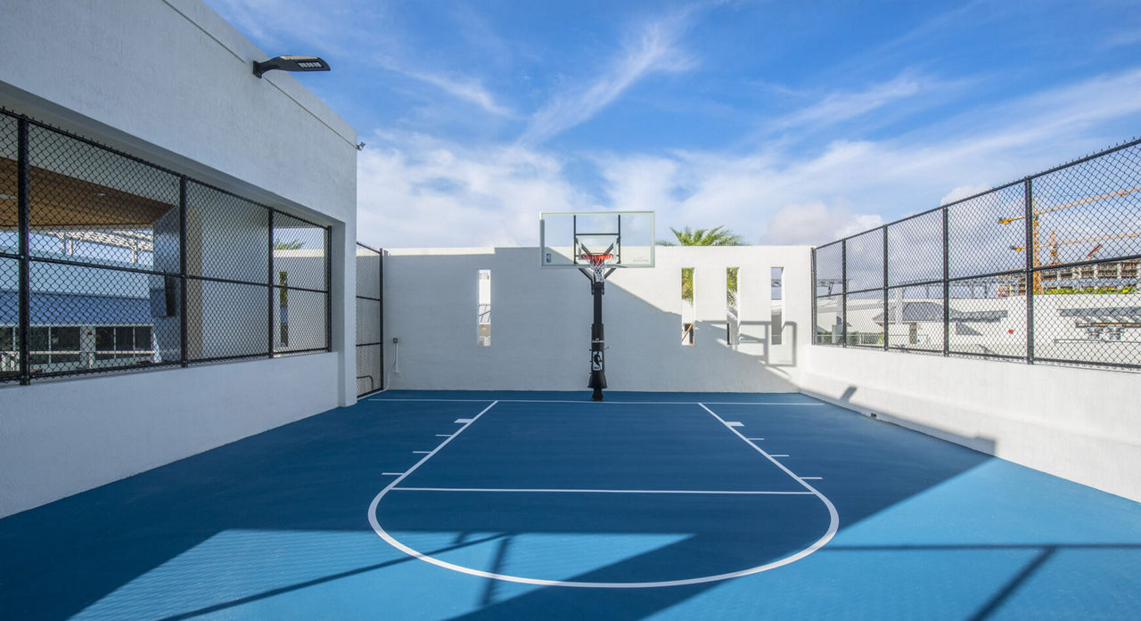 Outdoor basketball court with blue flooring | Blog | Greystar